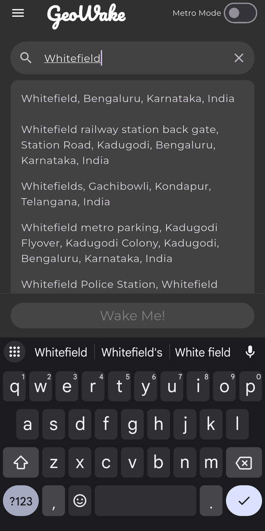 Destination search in GeoWake showing autocomplete results for the query Whitefield, including Whitefield in Bengaluru, Whitefield railway station back gate and Whitefield metro parking.
